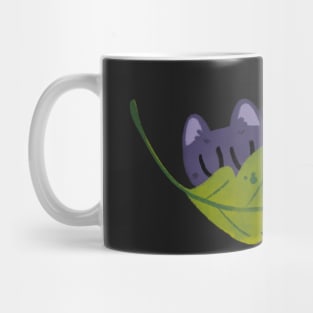 sleepy leaf cat Mug